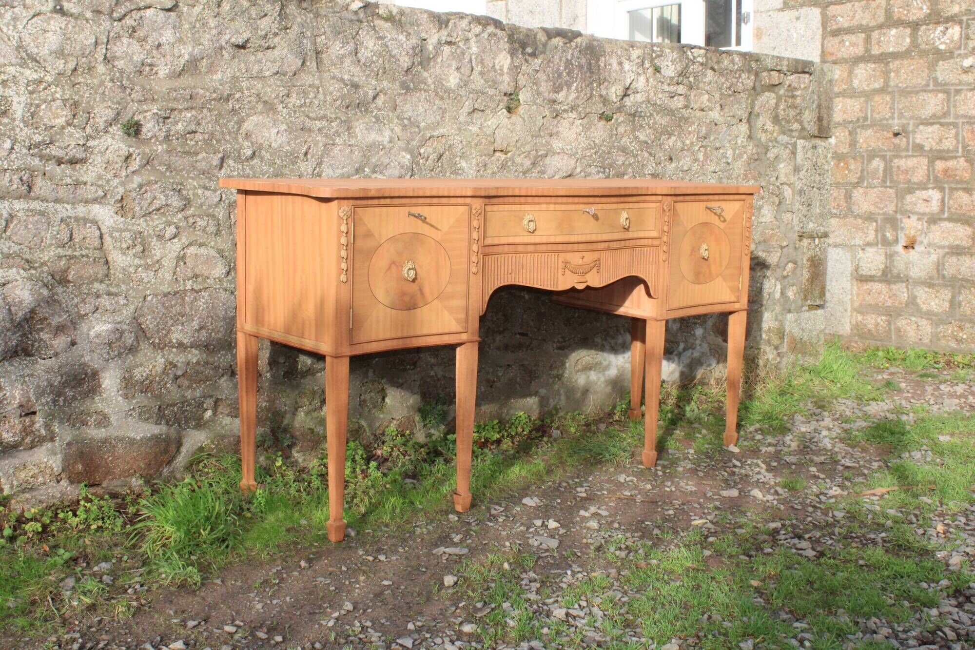English-made enfilade in Louis XVI style with light wood veneers.
