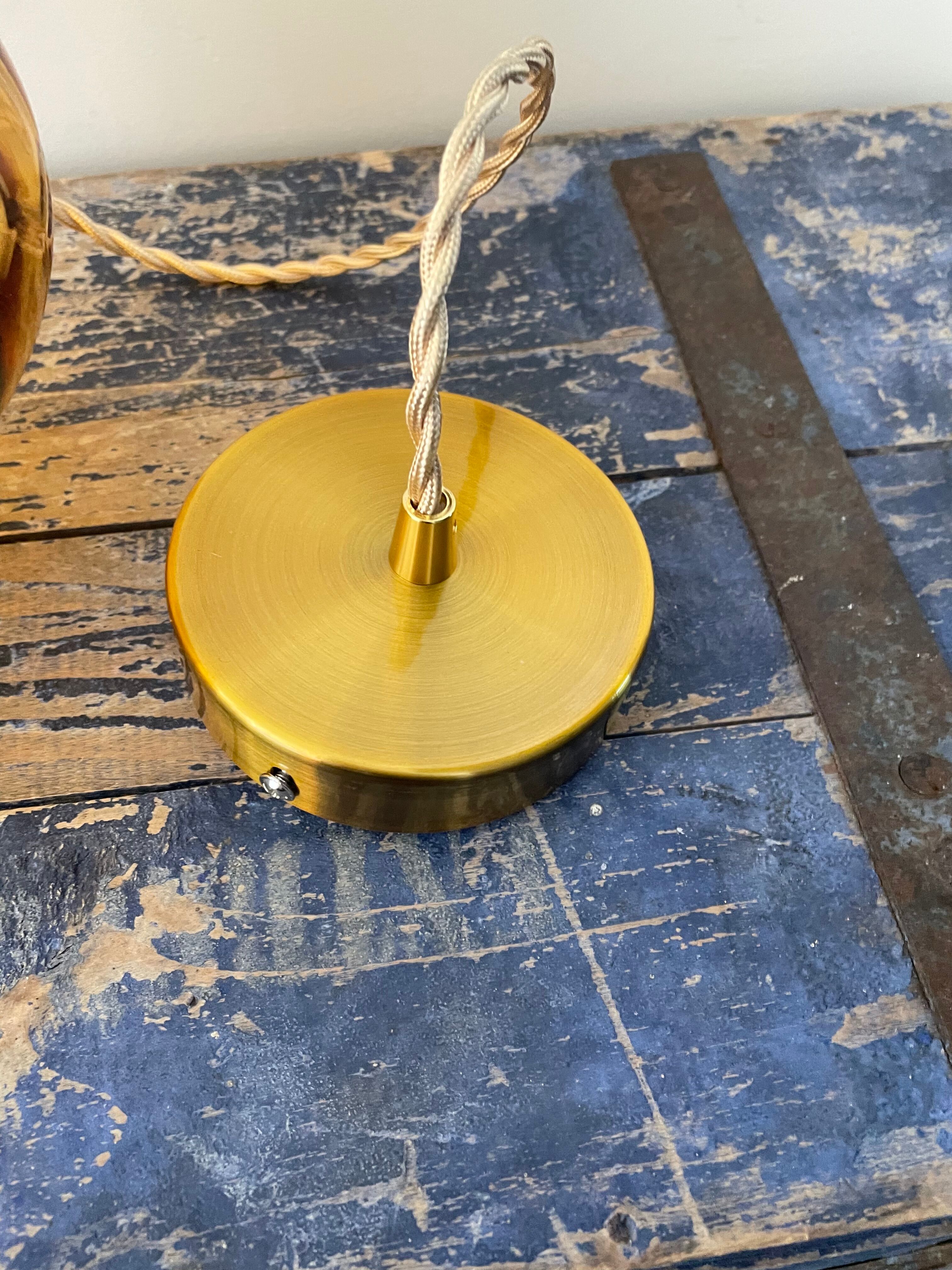 Vintage suspension lamp in electrified amber glass to nine