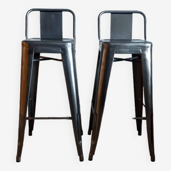 Pair of tolix hpd 75 stools – in varnished raw steel.