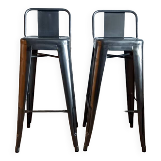 Pair of tolix hpd 75 stools – in varnished raw steel.