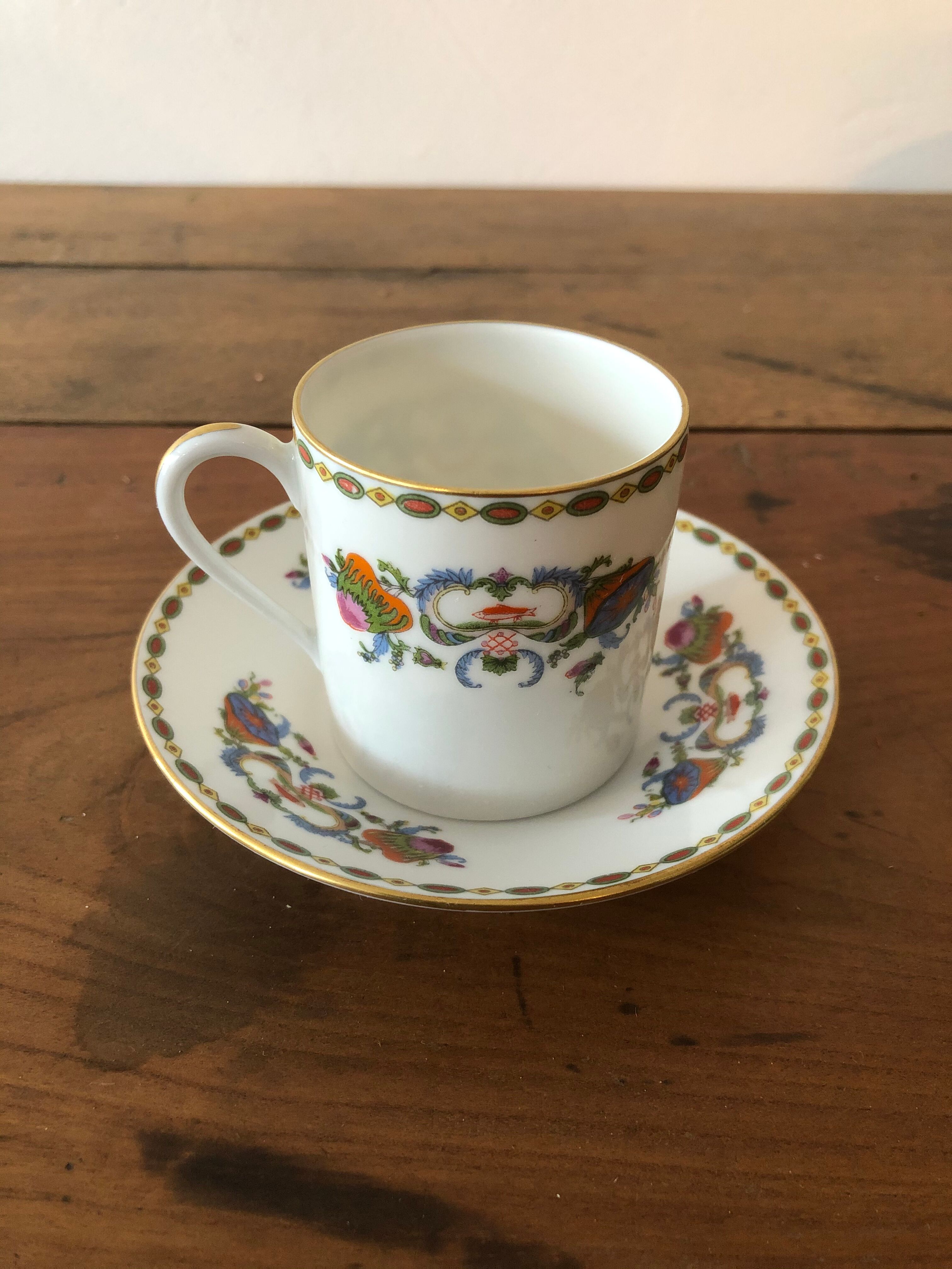 Service of 12 porcelain coffee cups, Raynaud, Limoges, 1950s.