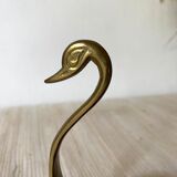 Empty brass swan pocket