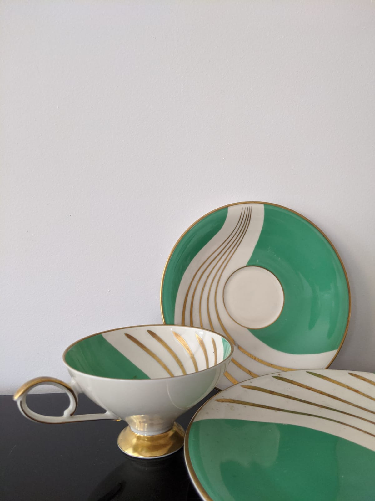 Tea cup and its vintage Art Deco style dessert plate