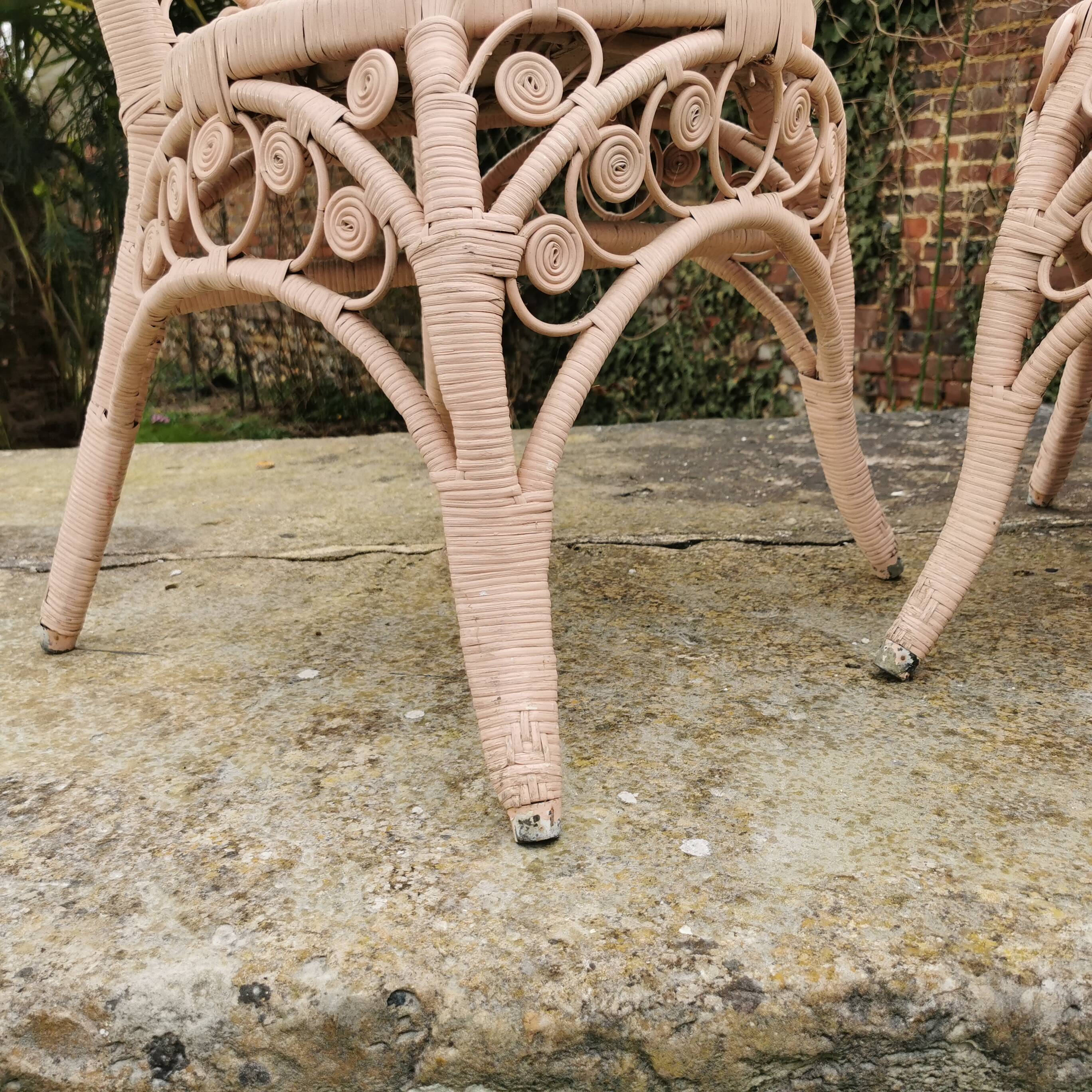 Pair of Peacock rattan chairs