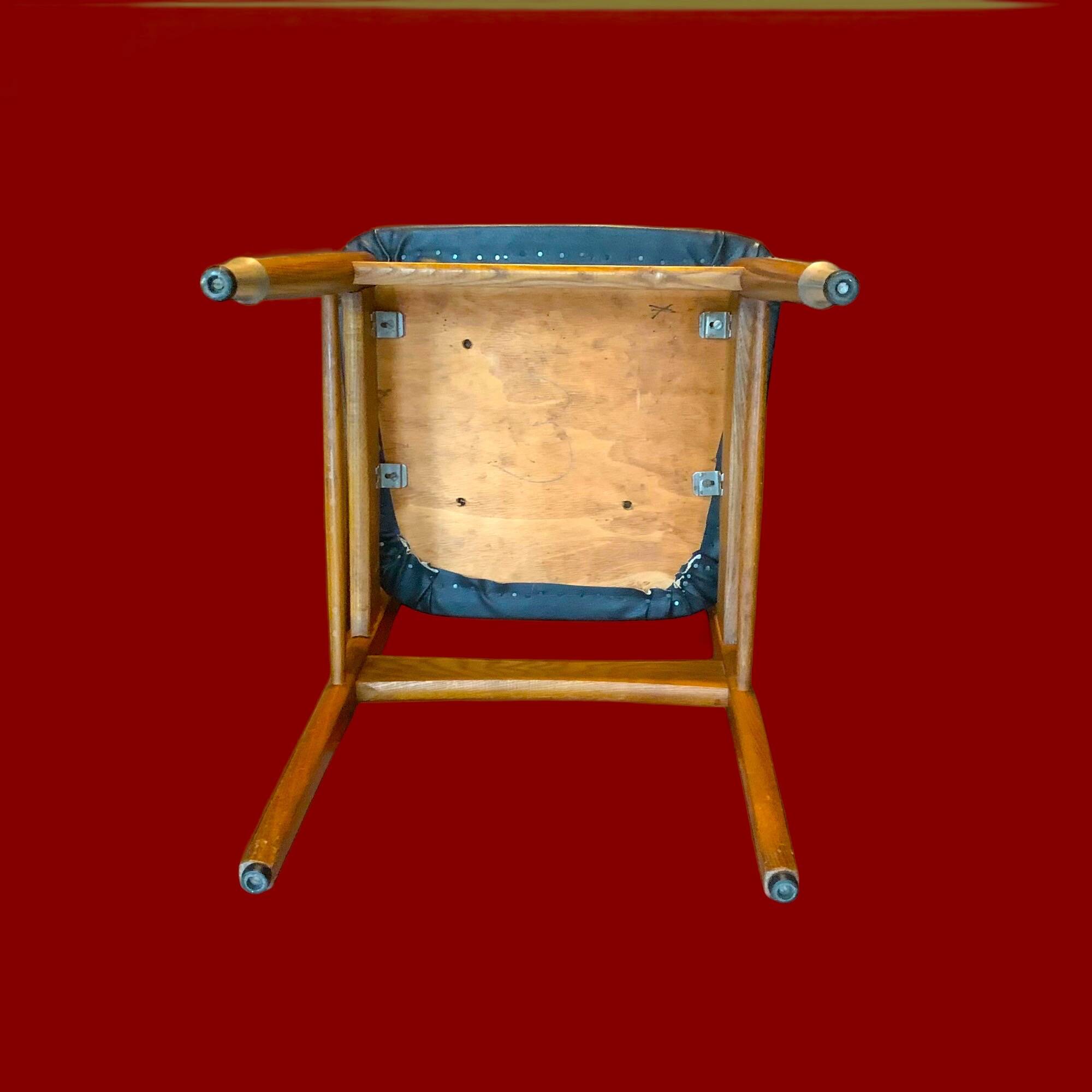 Pair of Scandinavian chairs in wood and black skai