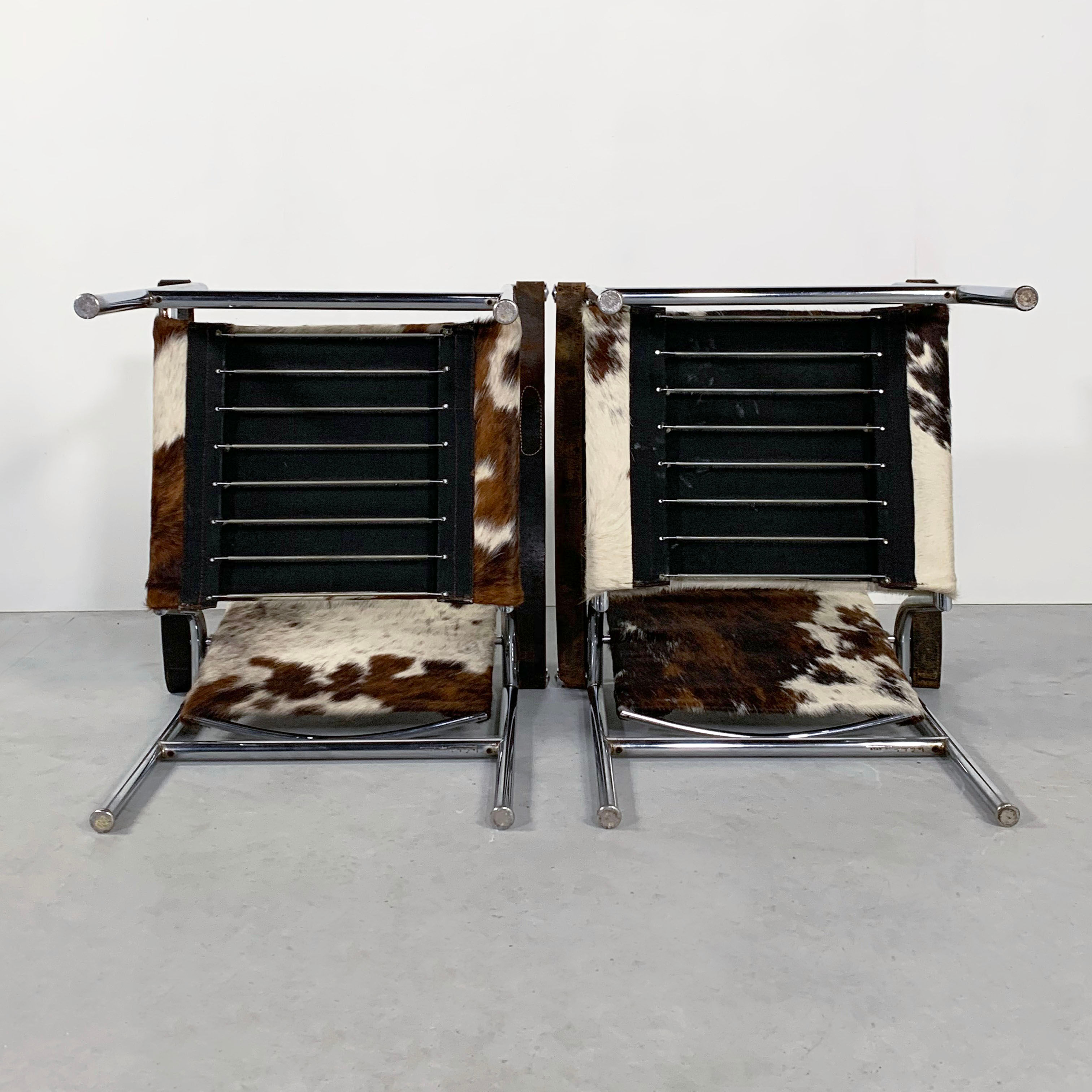 Pair of LC1 cow skin chairs by Le Corbusier for Cassina 1970