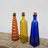 Trio of bottles 1970 color orange yellow and blue geometric shape