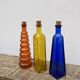 Trio of bottles 1970 color orange yellow and blue geometric shape