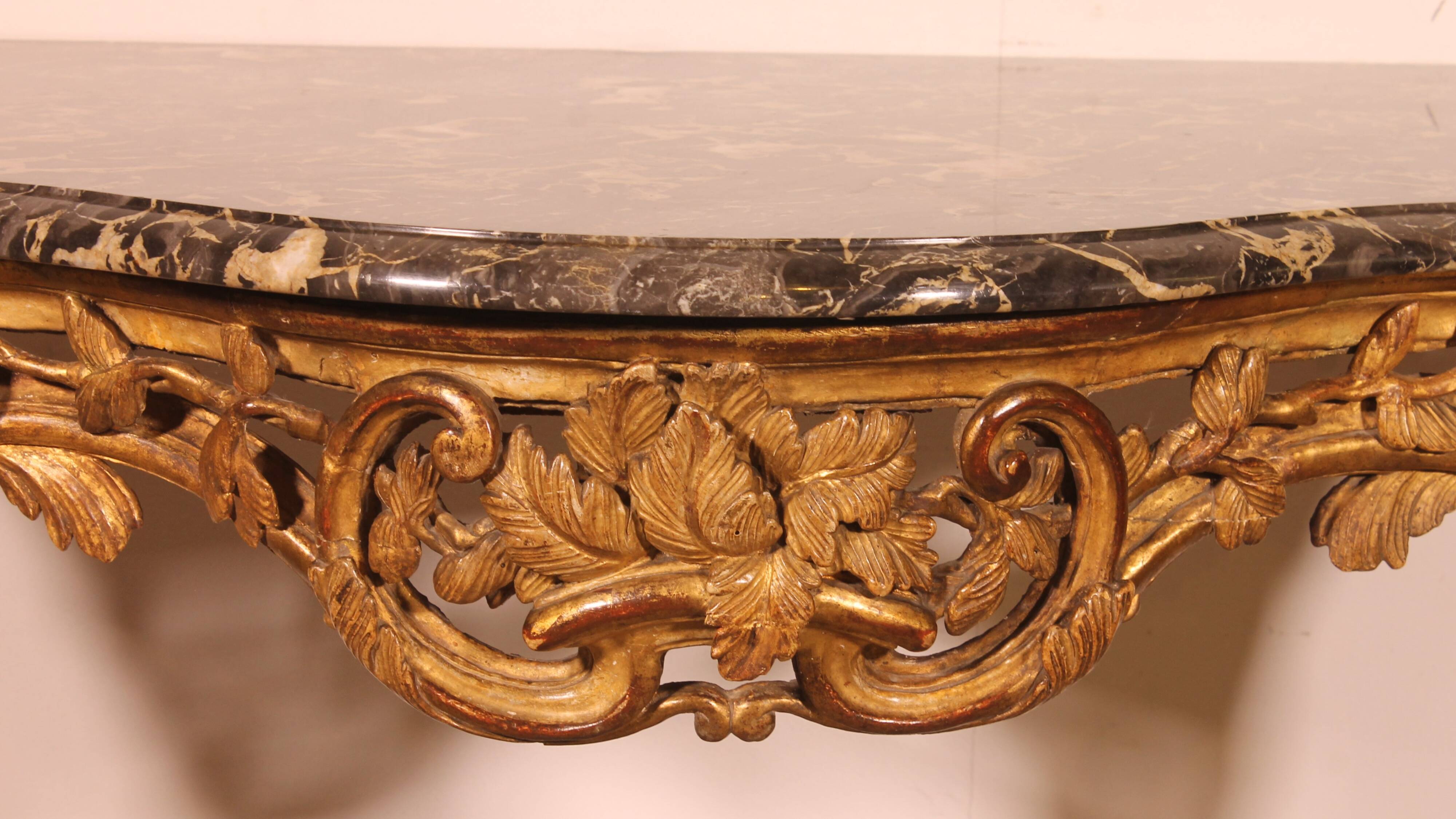 Louis XV period console in gilded wood