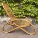 Curved bamboo and rattan armchair in Italian style by Roberti from the 1960s.