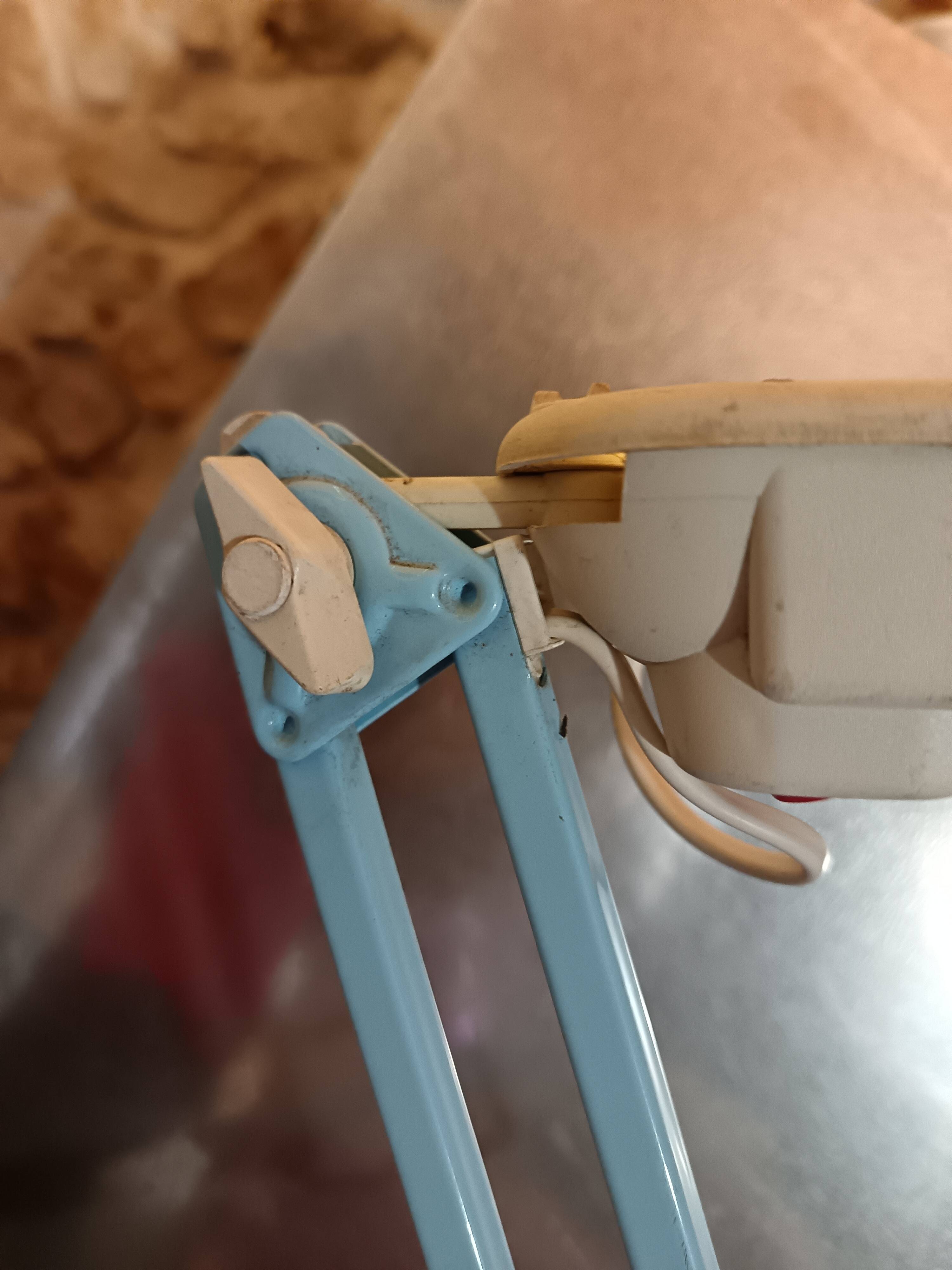 Articulated blue desk lamp