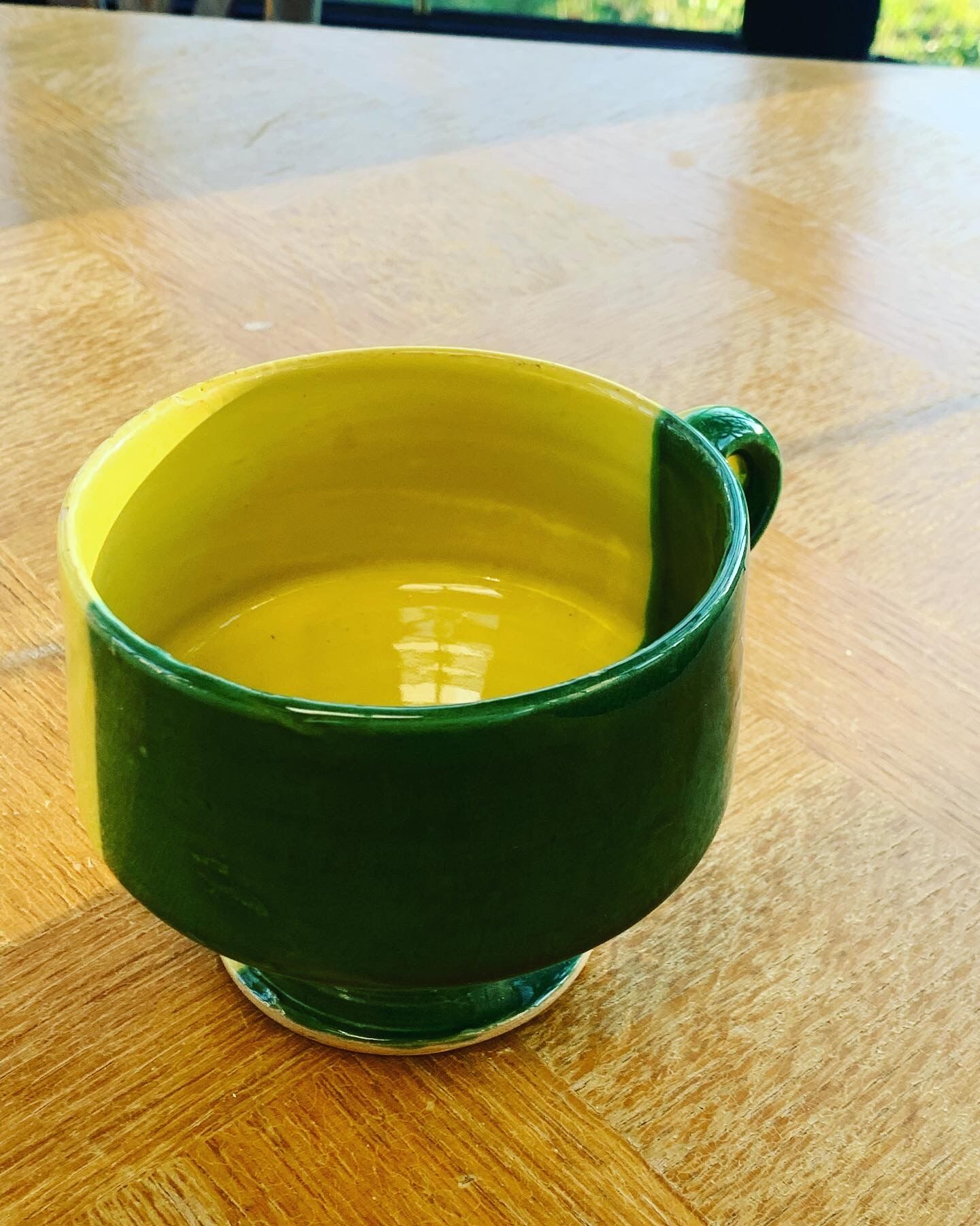 Large bowl in vintage green and yellow enamelled ceramic
