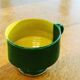 Large bowl in vintage green and yellow enamelled ceramic