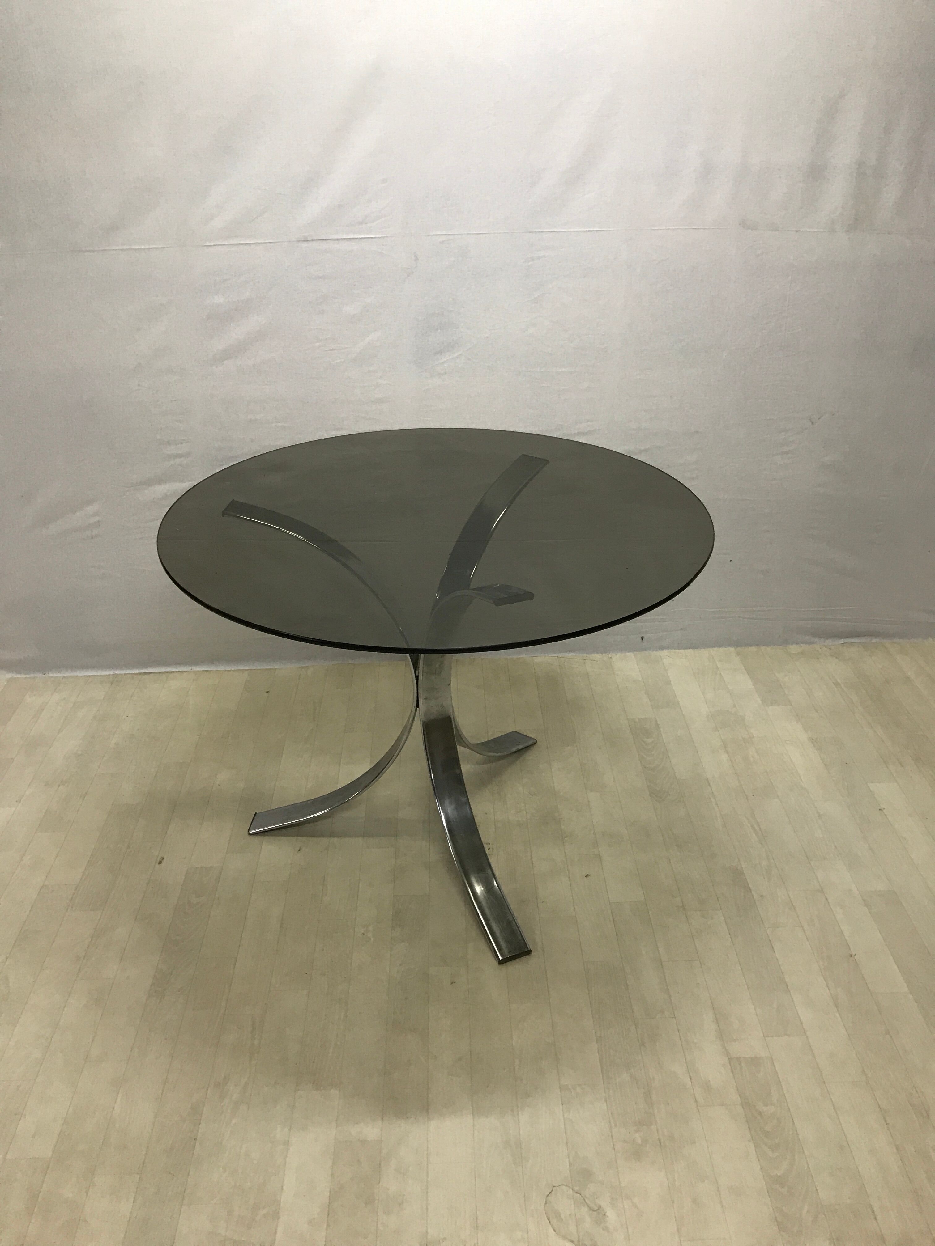 Chrome dining table and smoked glass