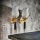 Pair of brass and black torchiere wall lights