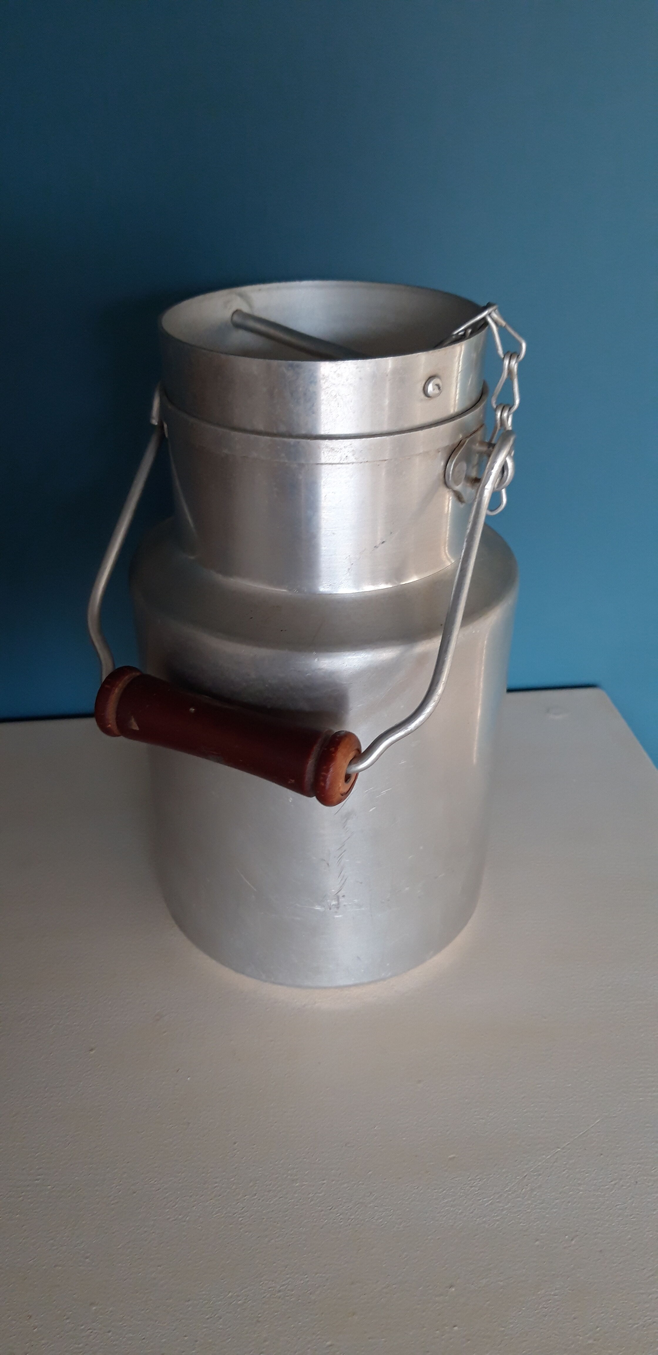 Antique milk jug in pure aluminum
