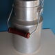 Antique milk jug in pure aluminum