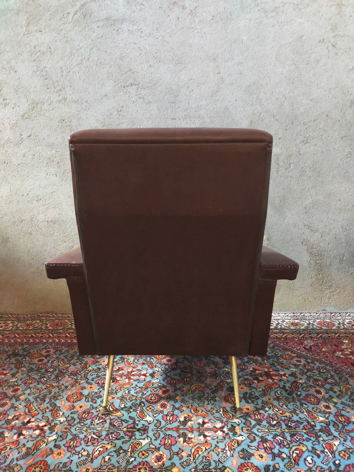 Vintage armchair in faux leather