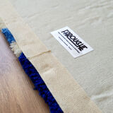 Tapis tufté main asymétrique 90x50