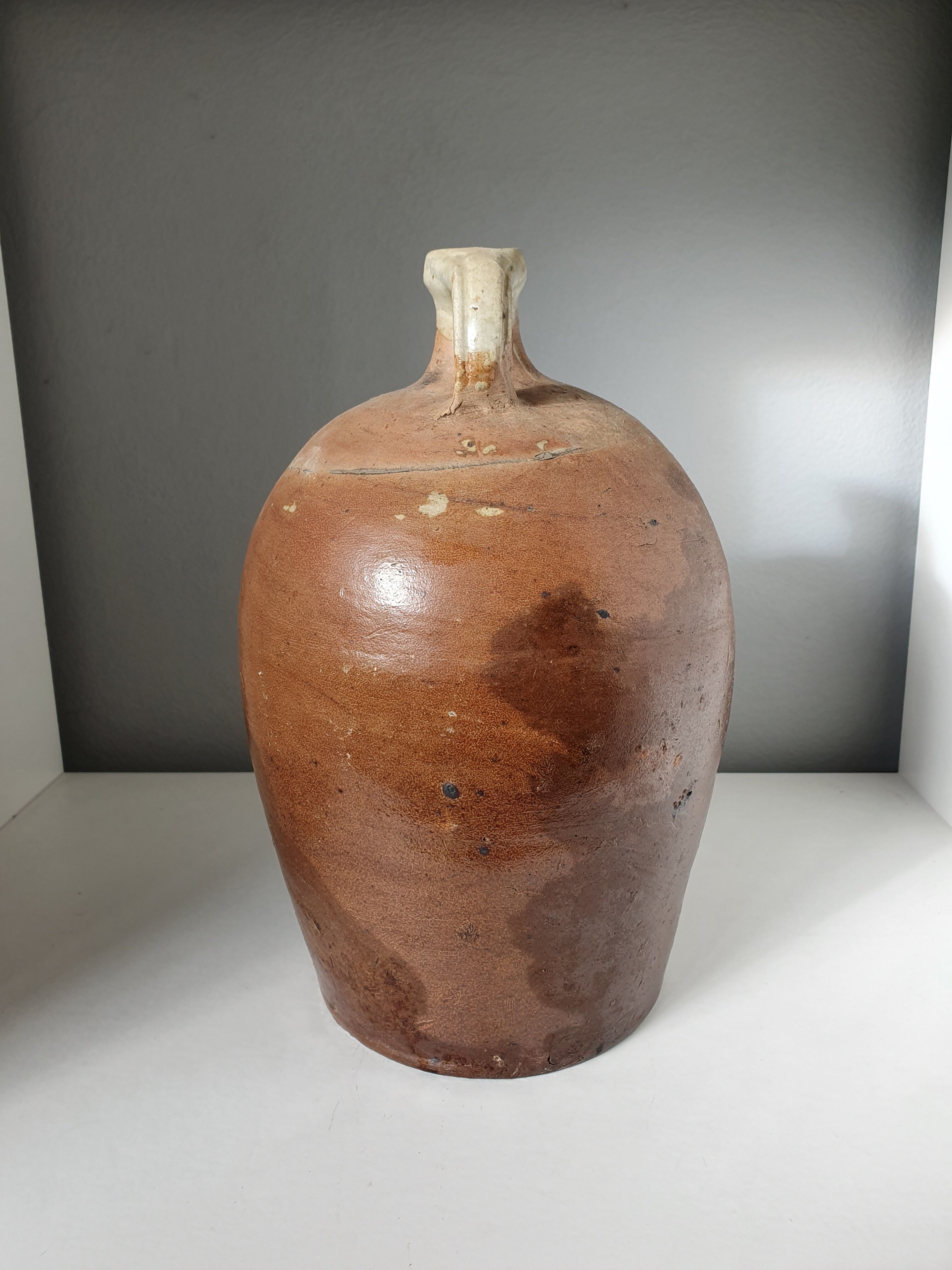 Enamelled sandstone jug