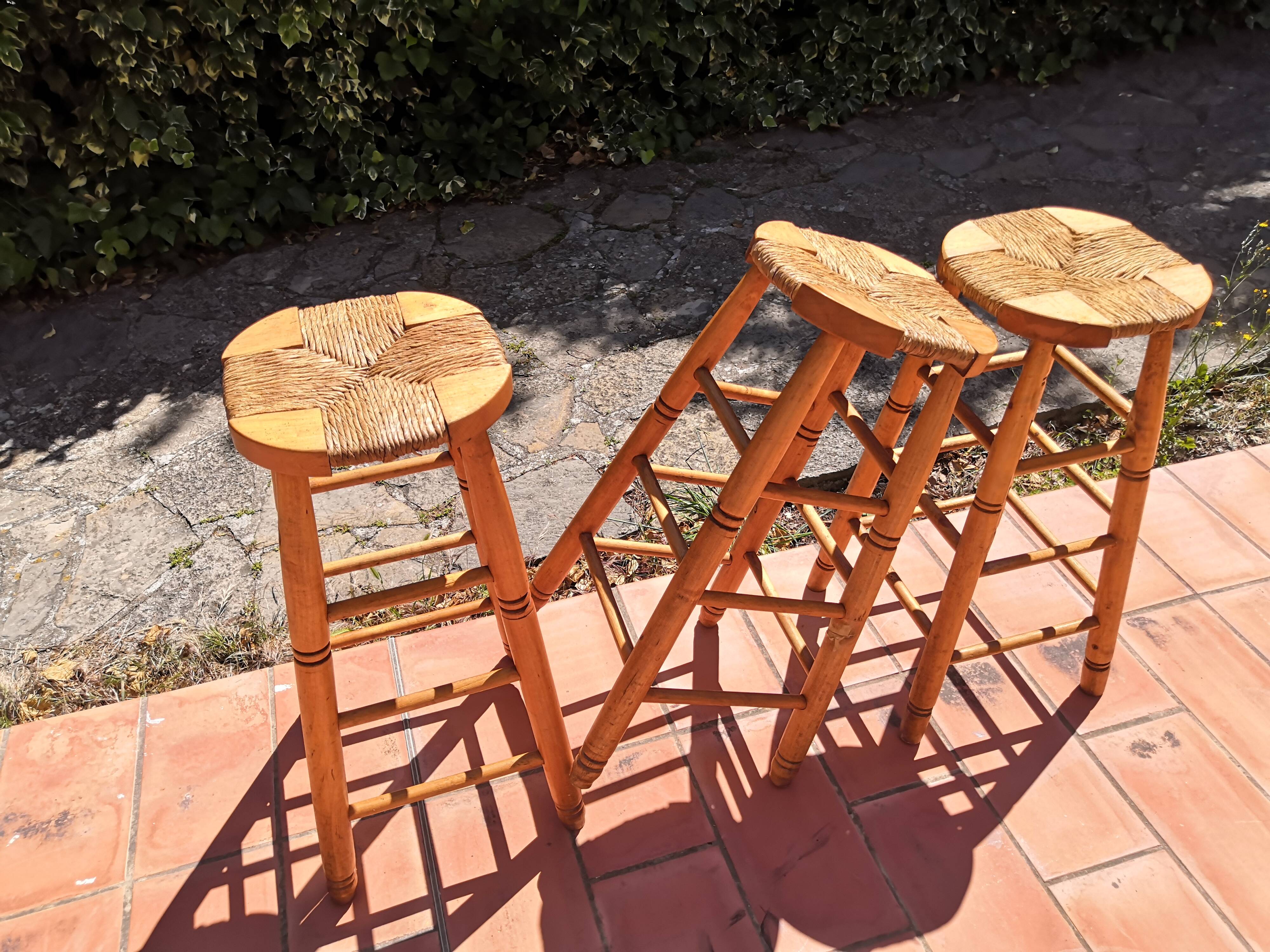 Set of 3 high “modernist” straw stools vintage 1950s