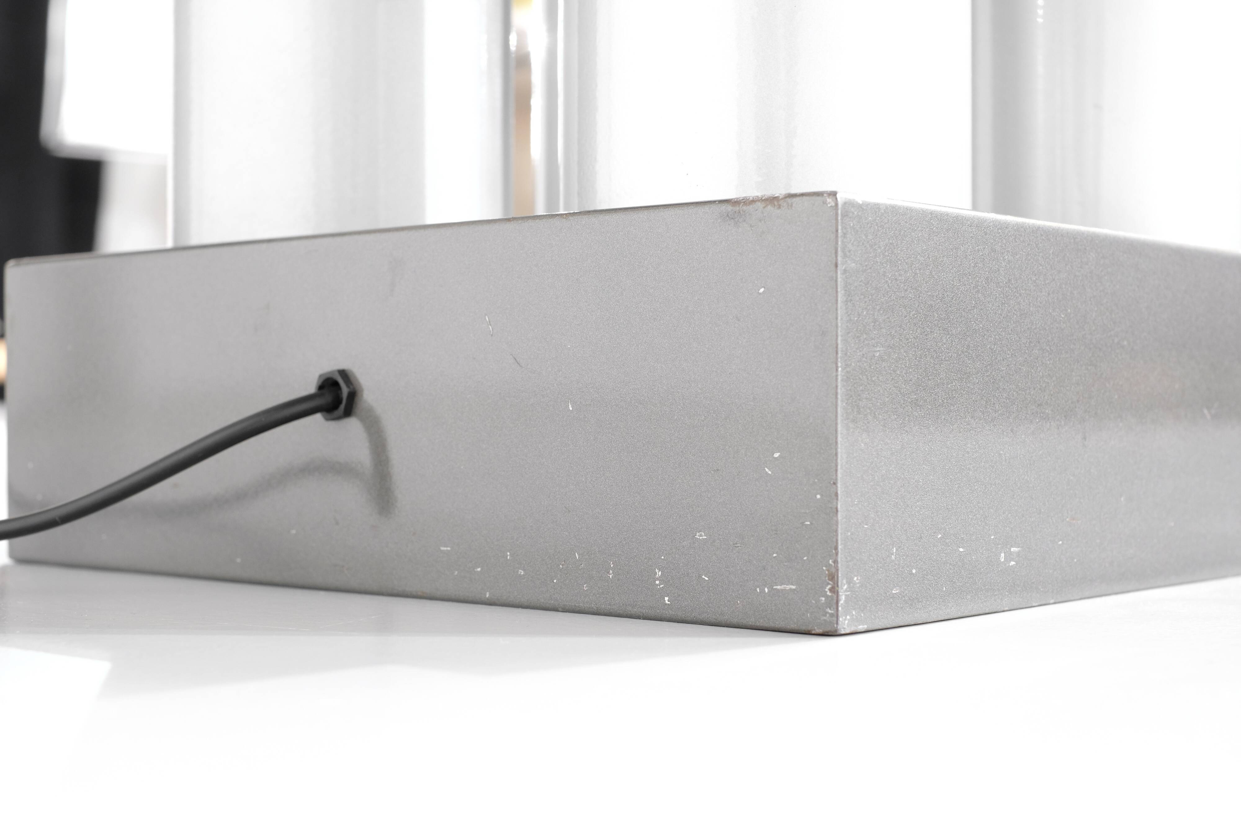 Floor lamp model "Chicago Tribune" in grey and silver enamelled metal, with