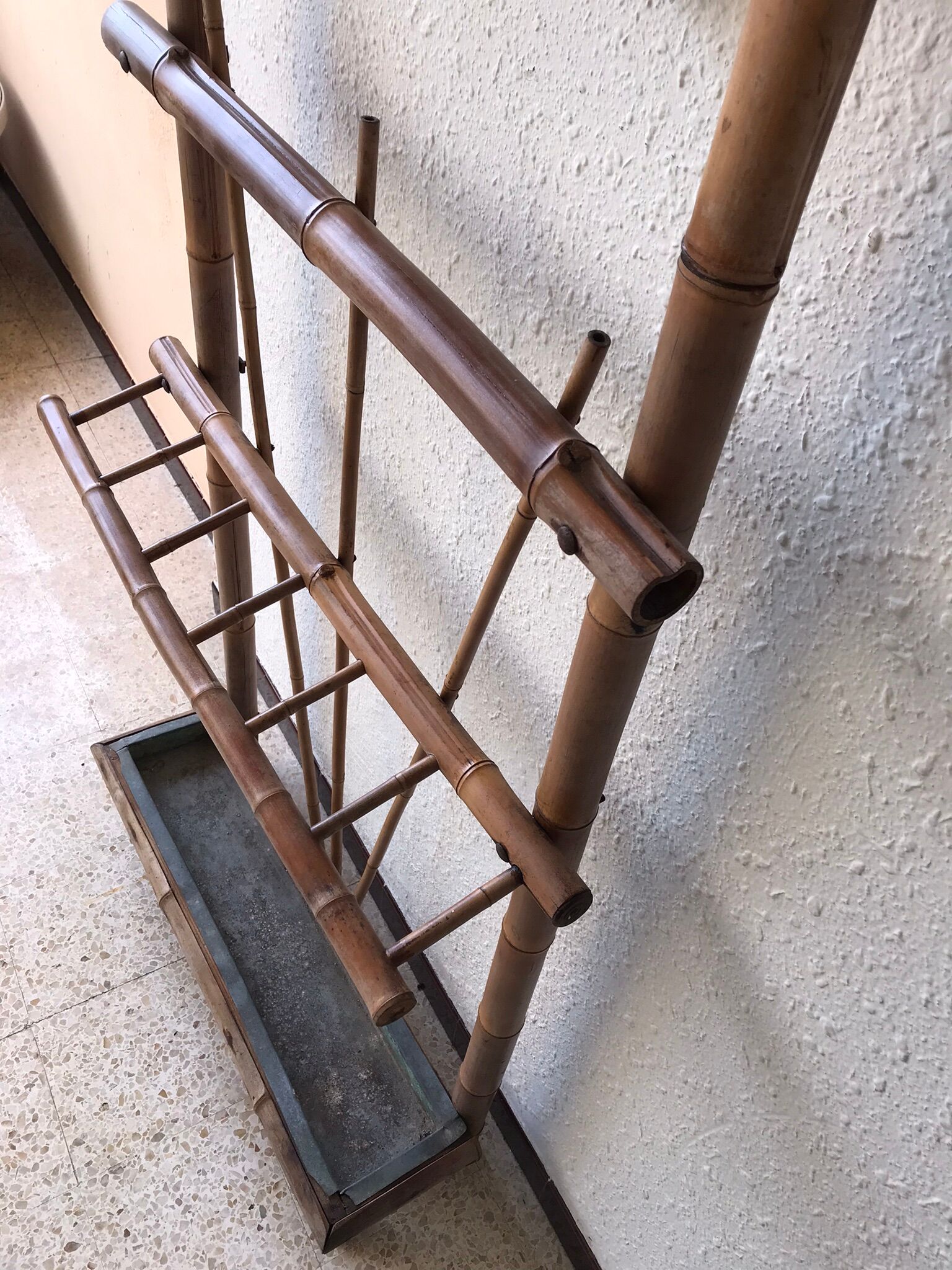 Antique rattan coat rack