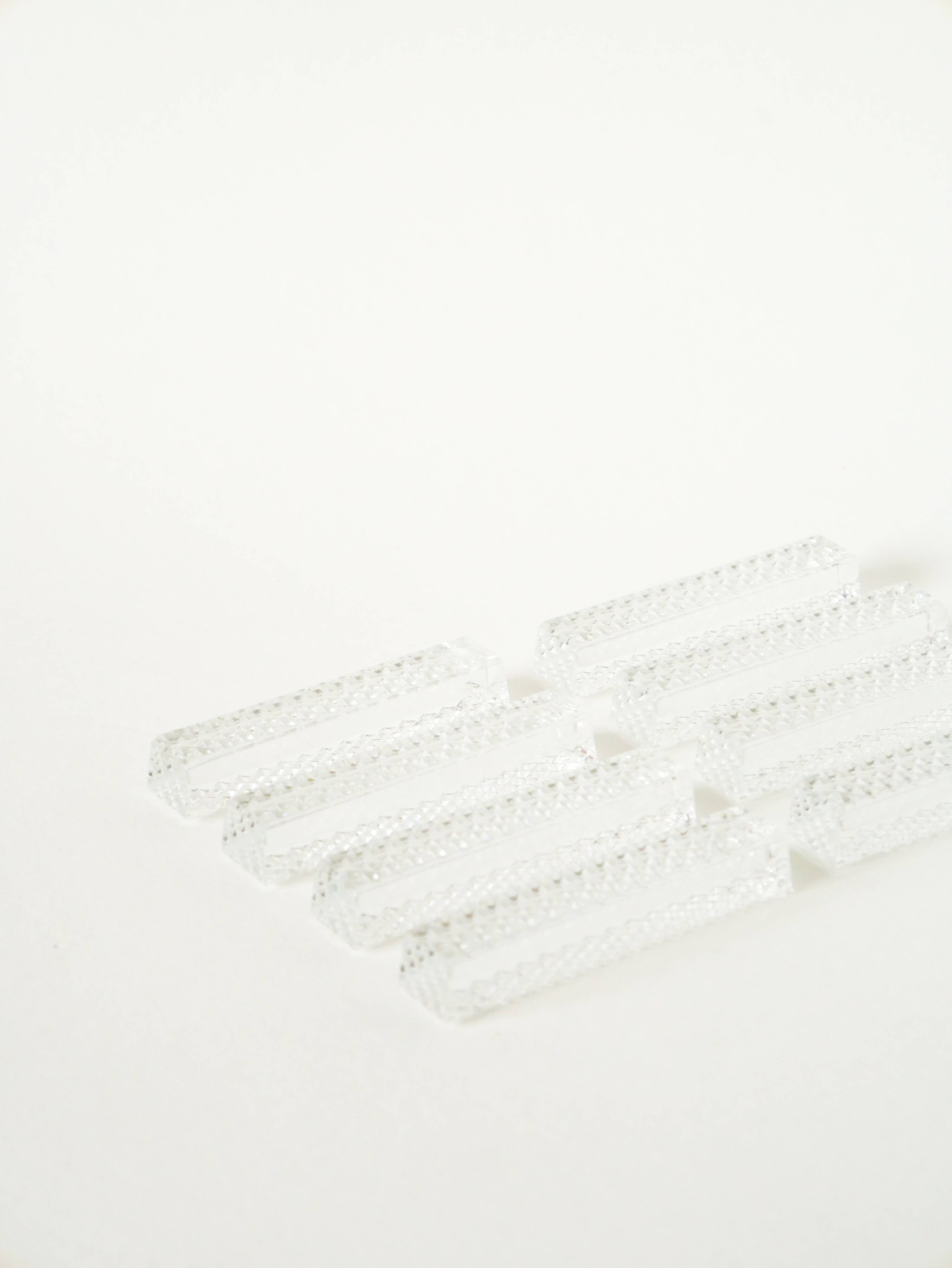 Set of 8 rectangular crystal knife rests, 1950