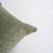 Fauteuil et pouf Togo en tweed émeraude