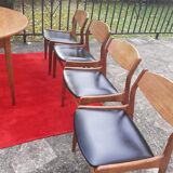 Roundtable with extension cords and chairs from the 1960s