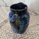 Antique pitcher in enamelled ceramic