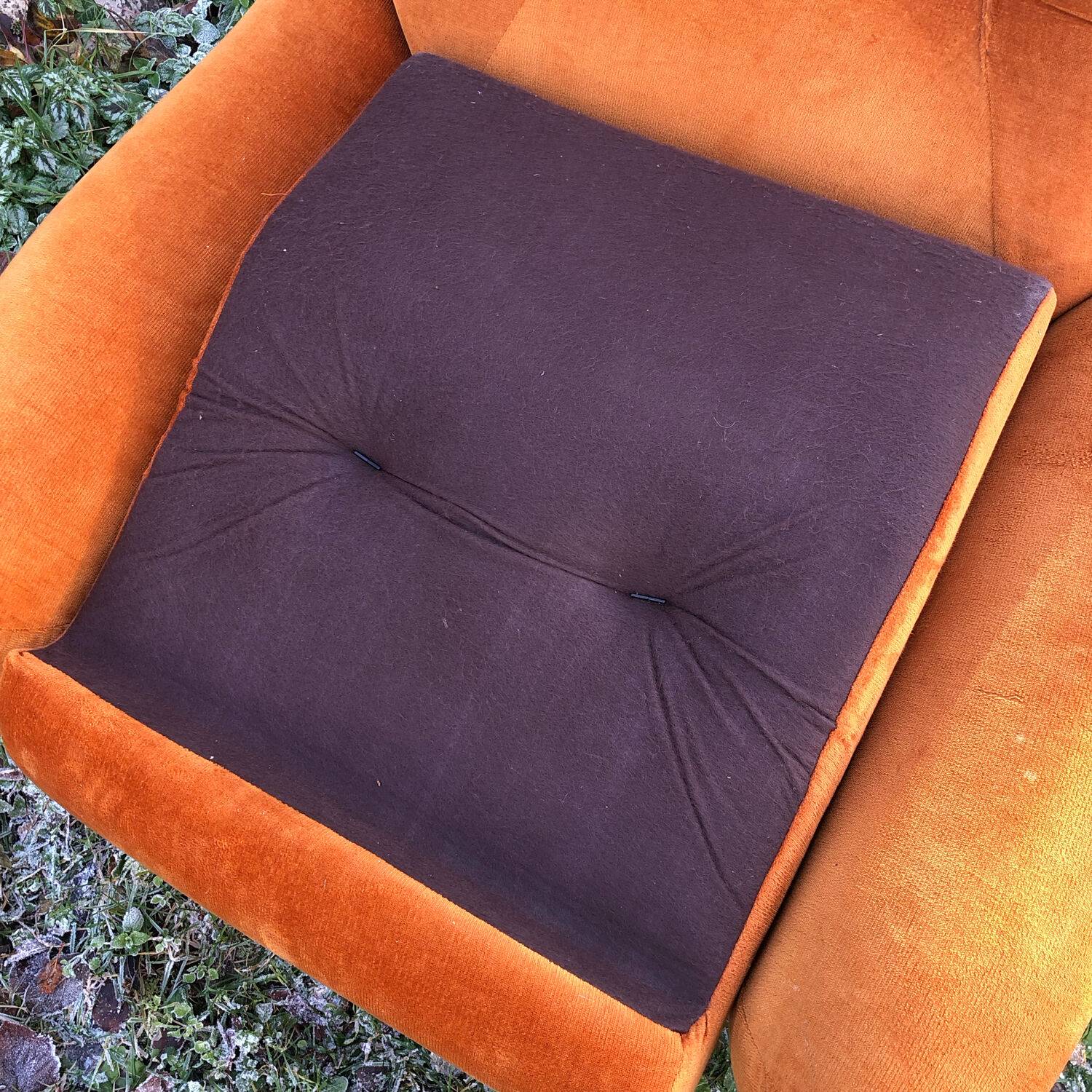 Orange velvet armchair
