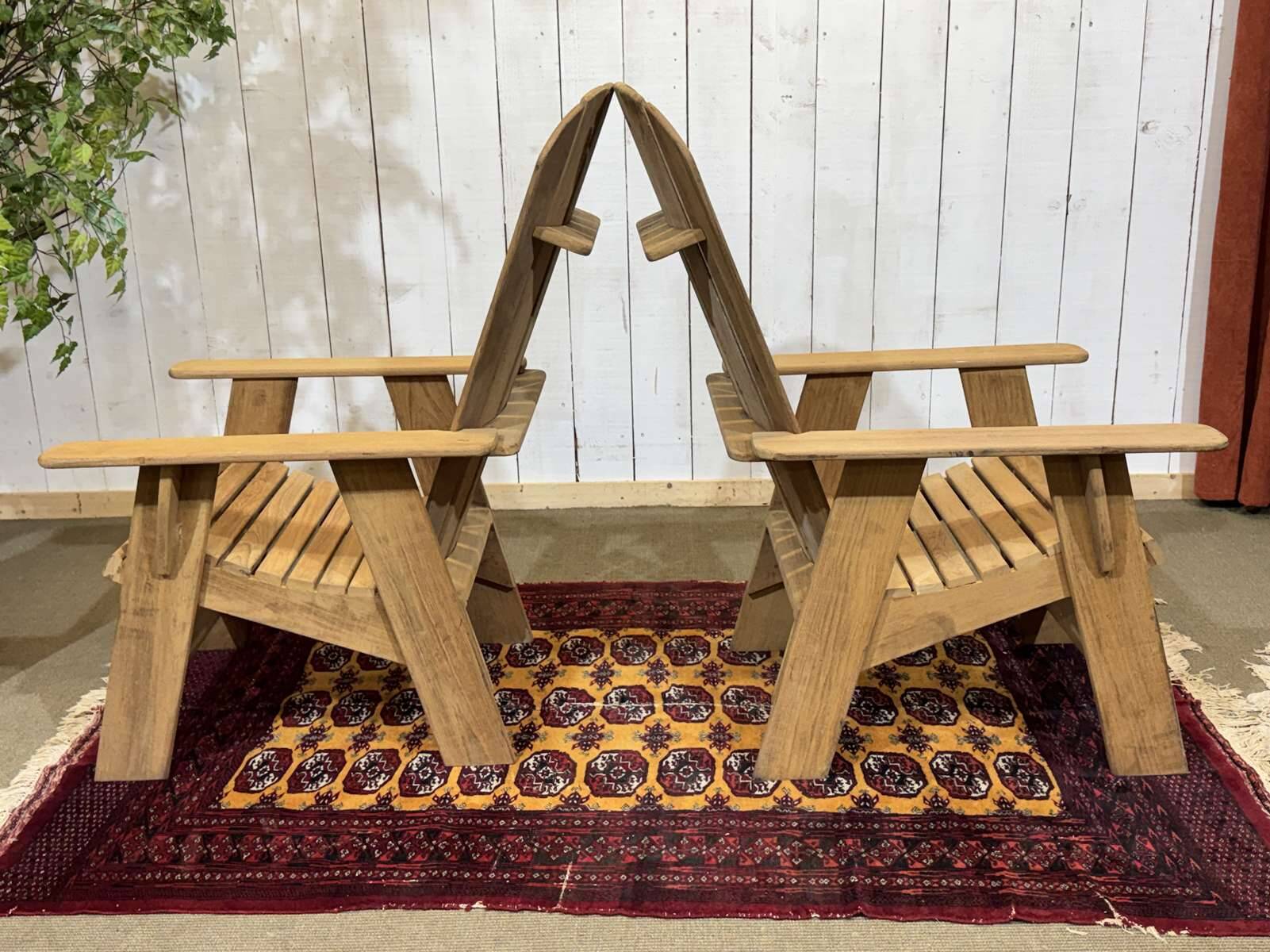 Pair of Indian teak armchairs