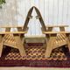 Pair of Indian teak armchairs