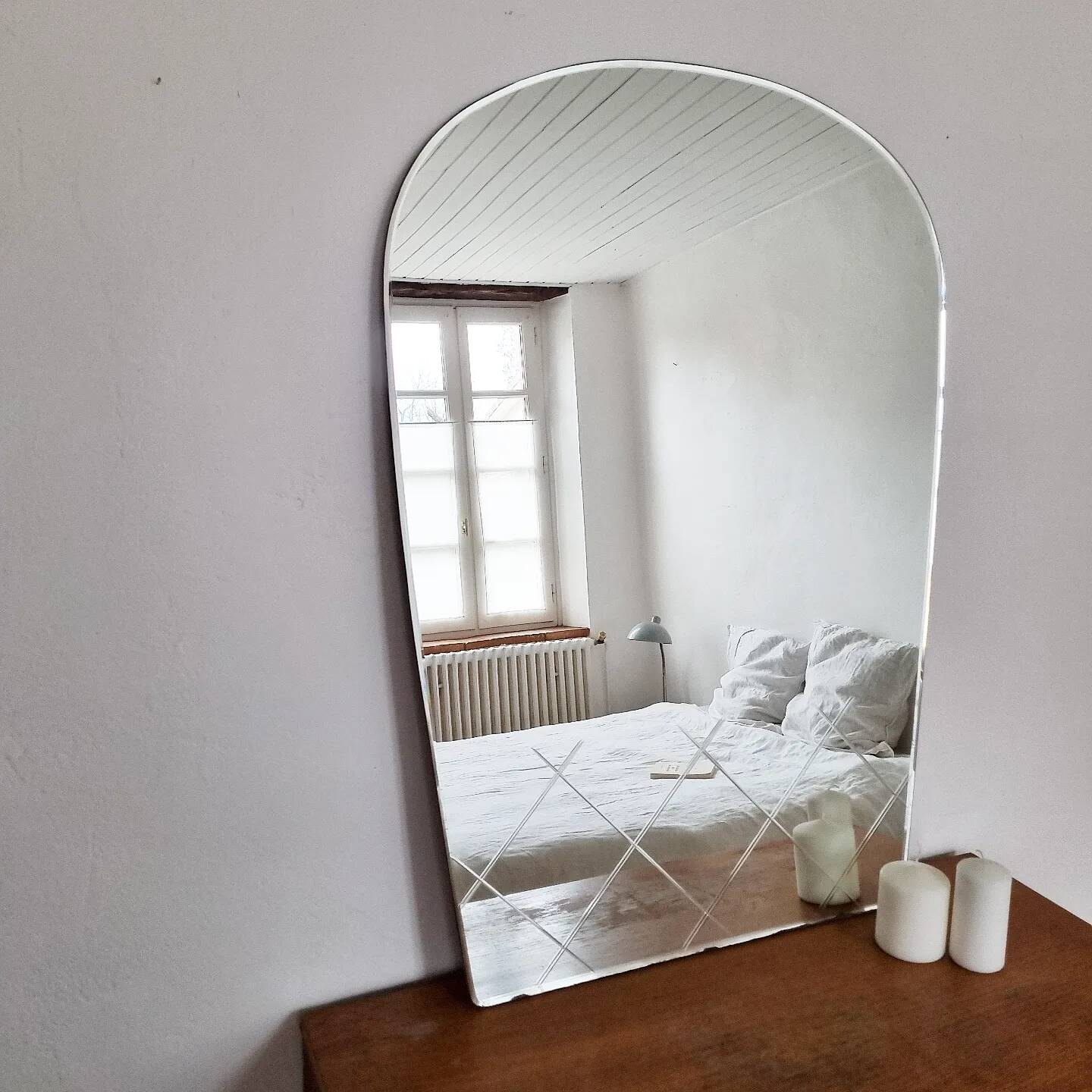 Large vintage beveled arch mirror