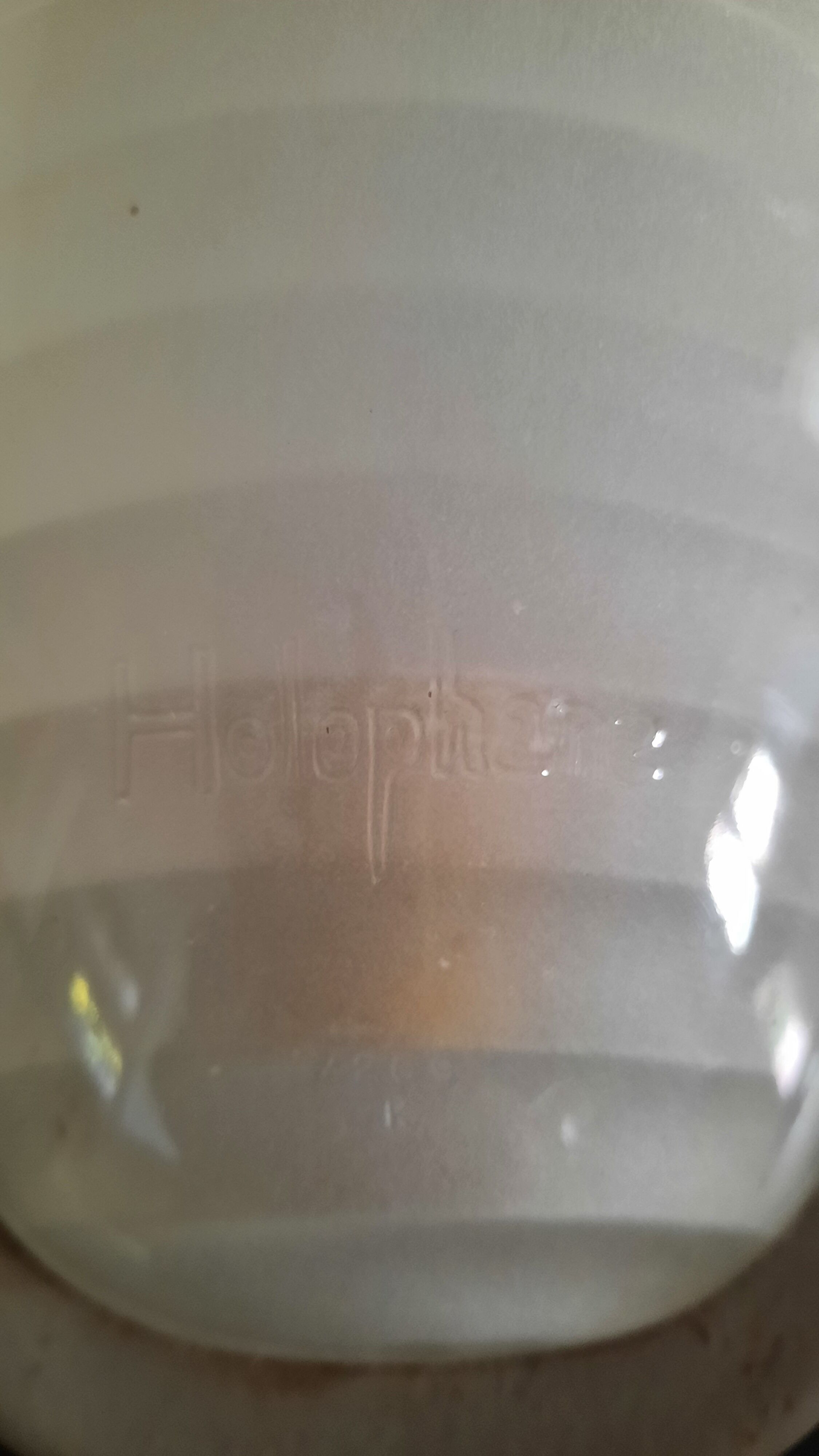 Holophanous cast iron wall lamp