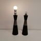 Two table lamps made of dark-stained wood with silver detail in the middle.