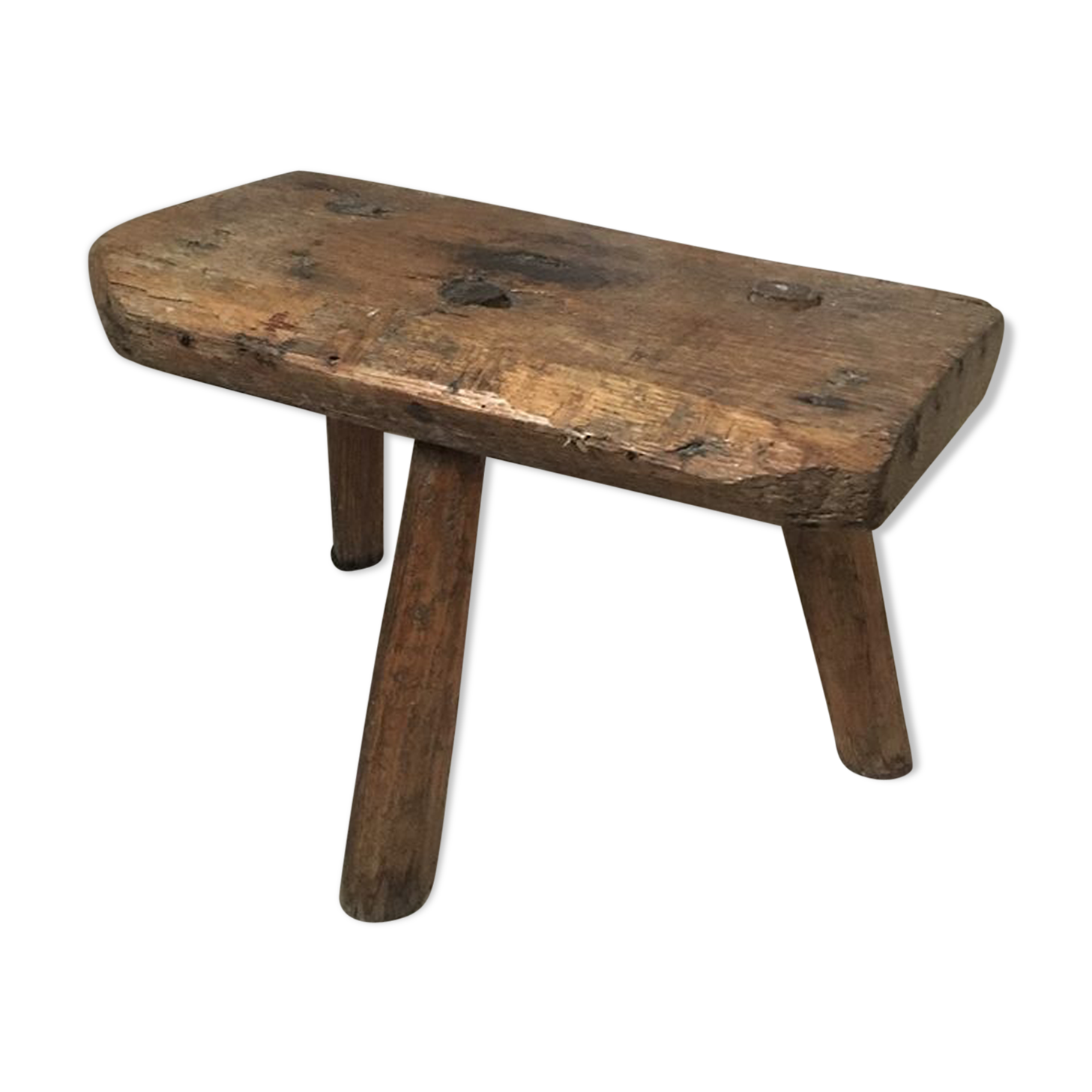 Crude wooden tripod stool