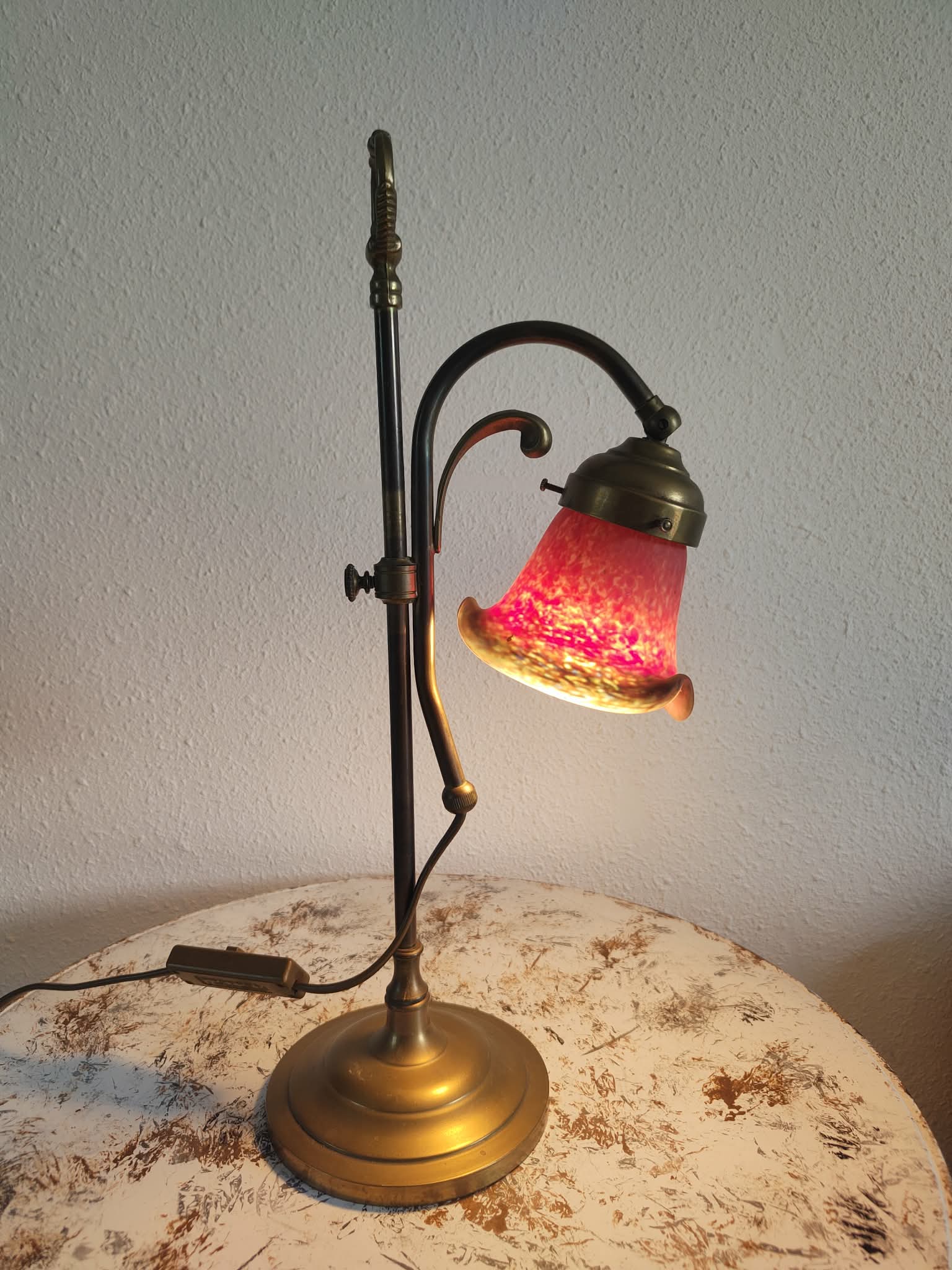 Brass articulated lamp with glass paste signed art of France.