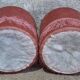 Set of crapaud armchair and 2 Napoleon III pink velvet poufs from the 19th century.