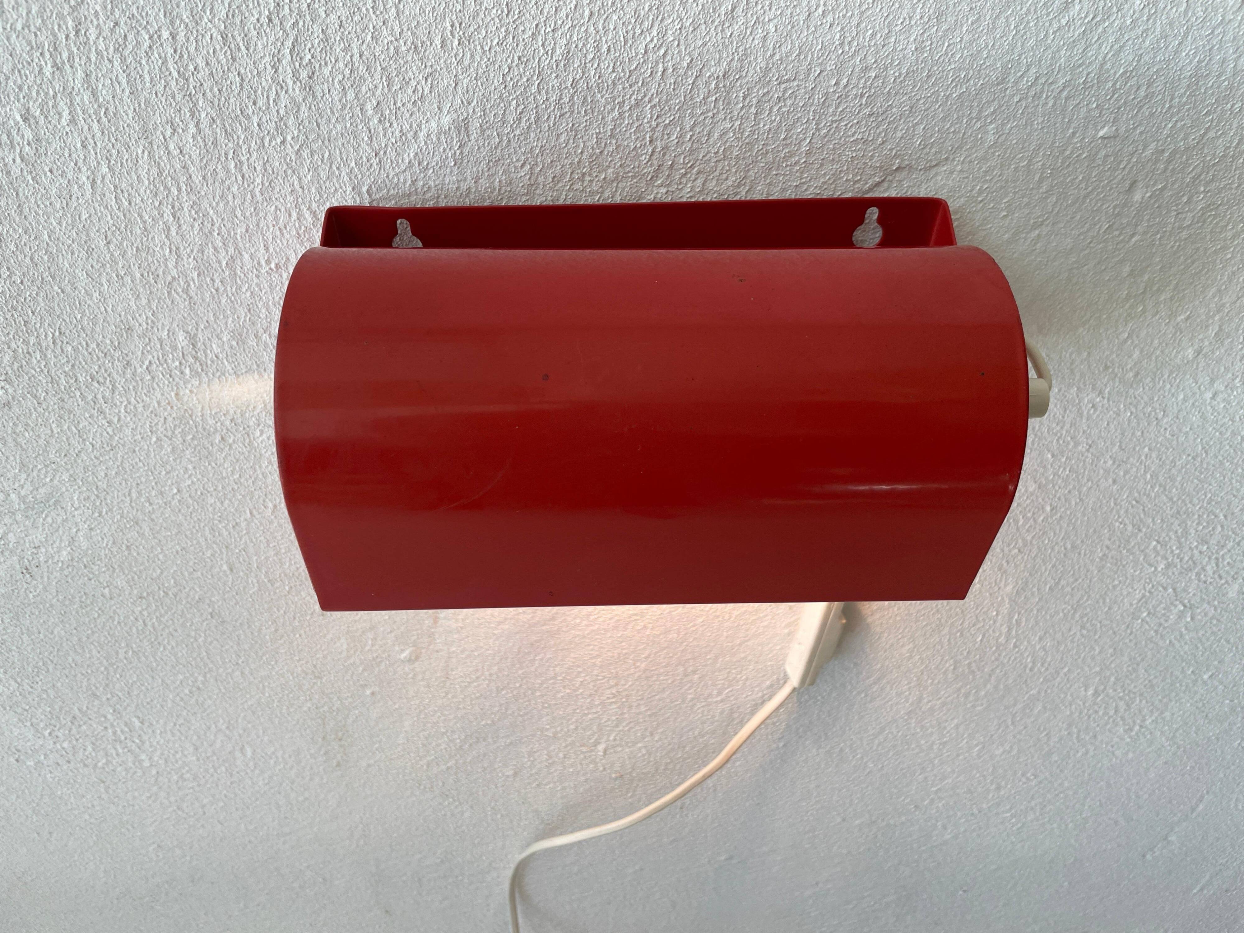 Simple red metal wall light from the AGE, 1970s, Germany.