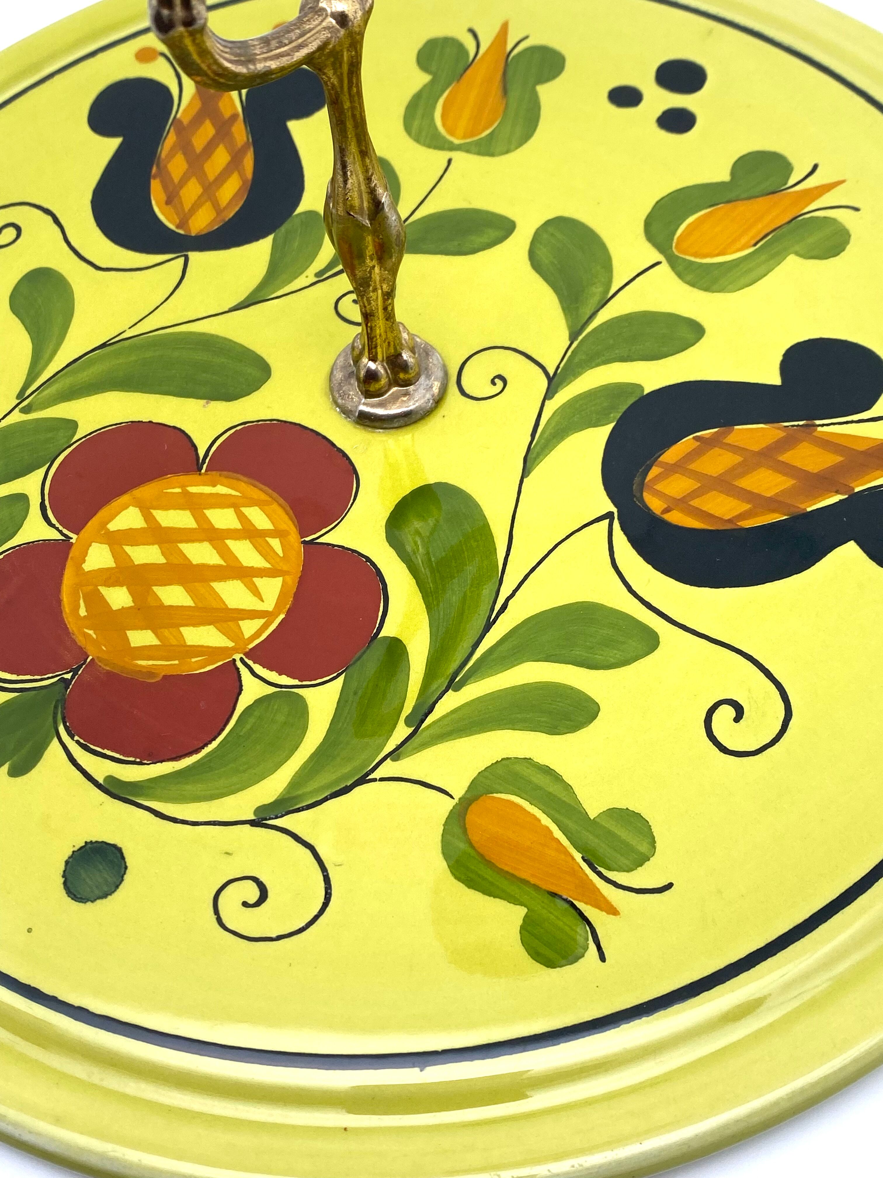 Cheese platter with floral handle