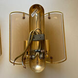 Pair of brass and smoked glass wall lights