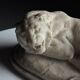 Marble sculpture of a reclining lion