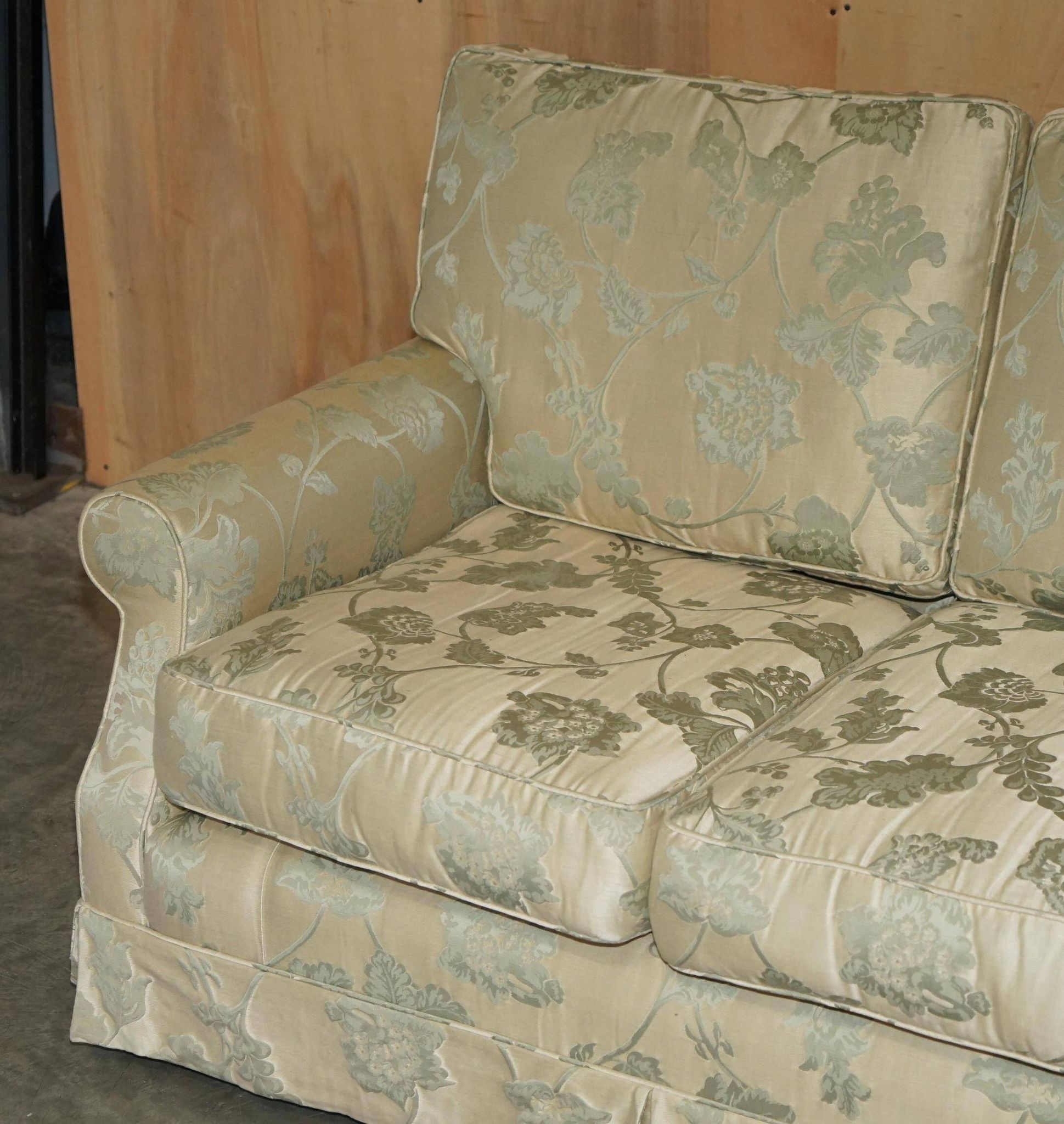 Pair of Howard & Son's style sofas in floral patterned silk blend.