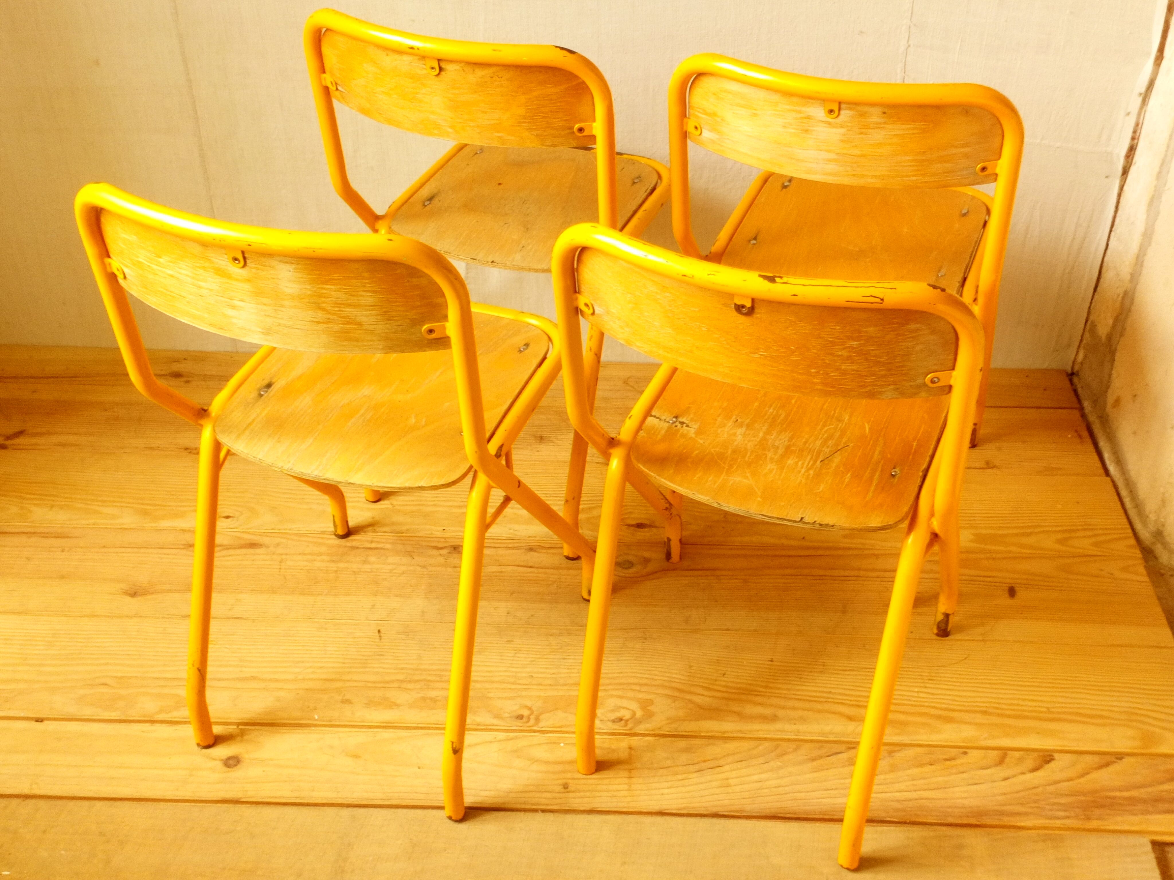 Four school chairs