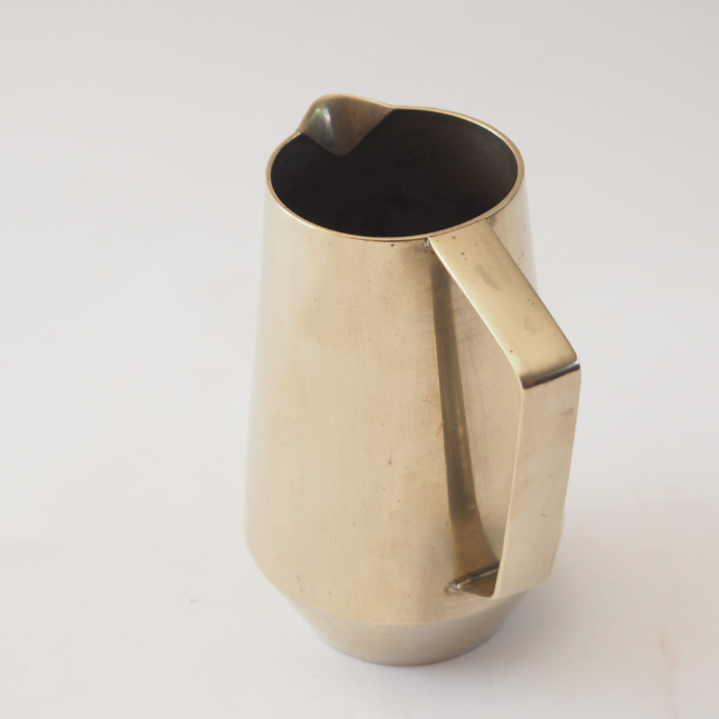 Duo of bronze pitchers