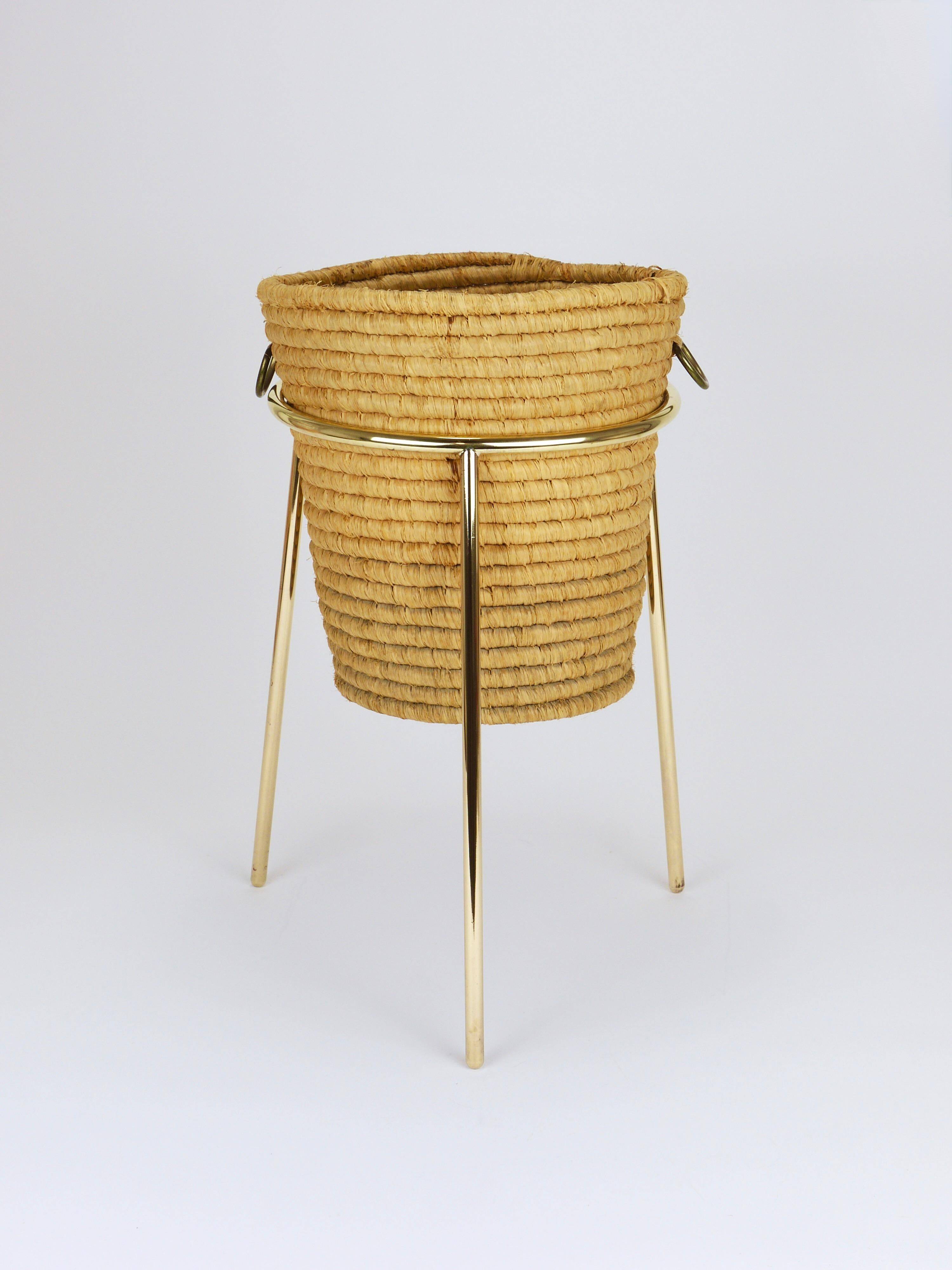 Carl Auböck II paper basket in raffia and brass, umbrella stand, 1950s