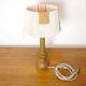 Wooden candle holder mounted as a lamp and its rope shade, 47.5cm.