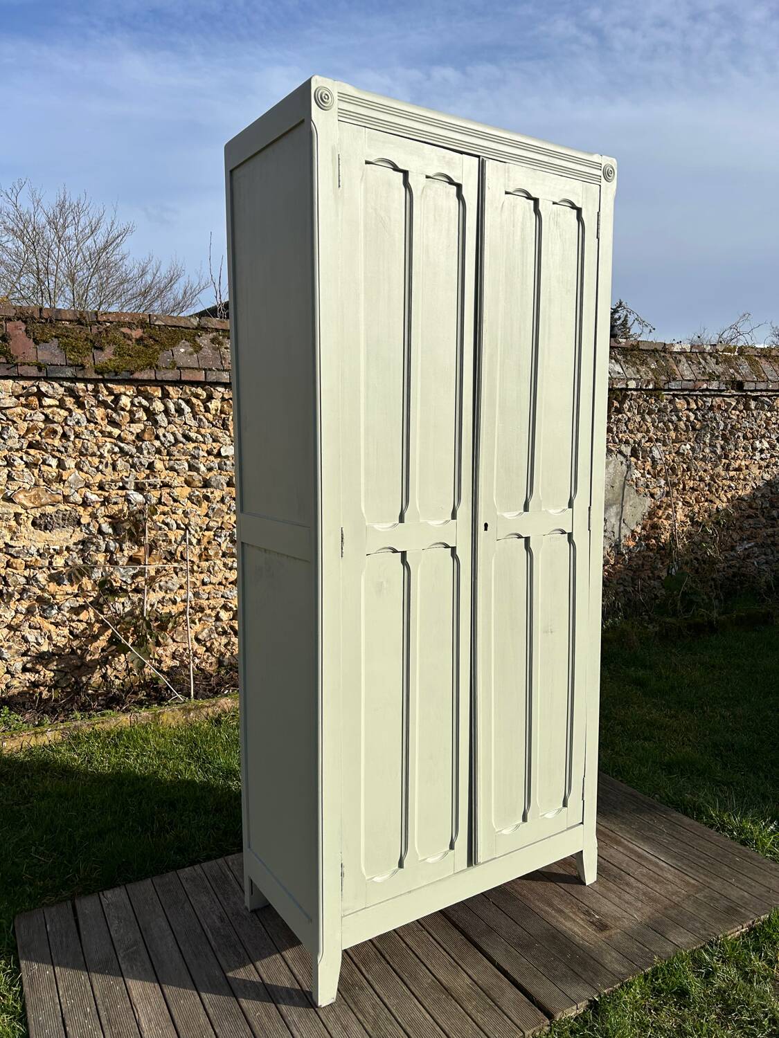 Restored vintage Parisian wardrobe from the 1930s in light green.